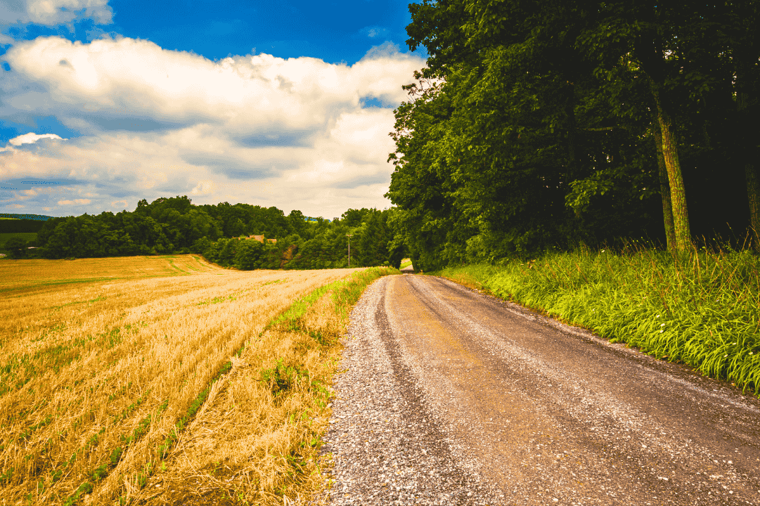 Farm field and dirt road in rural Carroll County, Maryland